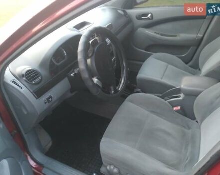 Красный Шевроле Нубира, объемом двигателя 1.6 л и пробегом 249 тыс. км за 3750 $, фото 2 на Automoto.ua