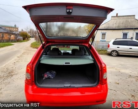 Красный Шевроле Нубира, объемом двигателя 2 л и пробегом 278 тыс. км за 4799 $, фото 6 на Automoto.ua