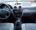 Красный Шевроле Нубира, объемом двигателя 1.6 л и пробегом 199 тыс. км за 5099 $, фото 2 на Automoto.ua