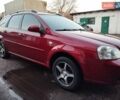 Красный Шевроле Нубира, объемом двигателя 1.6 л и пробегом 199 тыс. км за 5099 $, фото 1 на Automoto.ua
