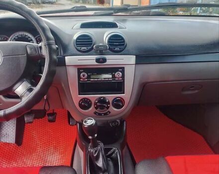 Красный Шевроле Нубира, объемом двигателя 1.6 л и пробегом 236 тыс. км за 3700 $, фото 14 на Automoto.ua