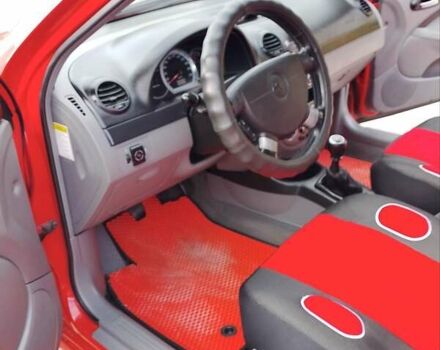 Красный Шевроле Нубира, объемом двигателя 1.6 л и пробегом 236 тыс. км за 3700 $, фото 2 на Automoto.ua