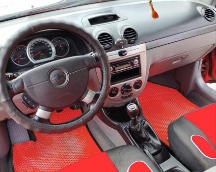 Красный Шевроле Нубира, объемом двигателя 1.6 л и пробегом 236 тыс. км за 3700 $, фото 9 на Automoto.ua