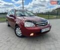 Красный Шевроле Нубира, объемом двигателя 1.8 л и пробегом 253 тыс. км за 3700 $, фото 1 на Automoto.ua