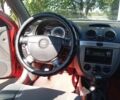 Красный Шевроле Нубира, объемом двигателя 1.6 л и пробегом 230 тыс. км за 3800 $, фото 5 на Automoto.ua