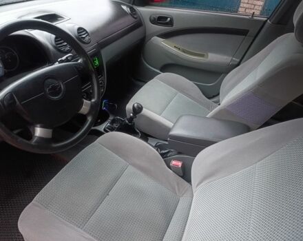 Красный Шевроле Нубира, объемом двигателя 1.6 л и пробегом 235 тыс. км за 3900 $, фото 10 на Automoto.ua