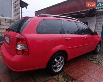Красный Шевроле Нубира, объемом двигателя 1.6 л и пробегом 235 тыс. км за 3900 $, фото 5 на Automoto.ua