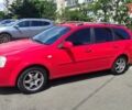 Красный Шевроле Нубира, объемом двигателя 1.6 л и пробегом 235 тыс. км за 3800 $, фото 1 на Automoto.ua