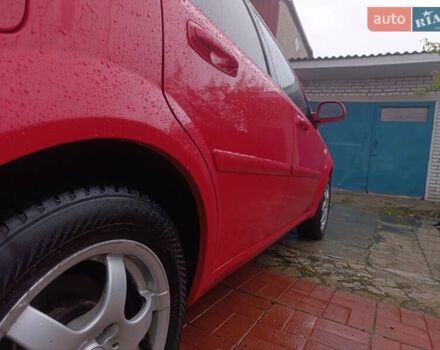 Красный Шевроле Нубира, объемом двигателя 1.6 л и пробегом 235 тыс. км за 3900 $, фото 18 на Automoto.ua