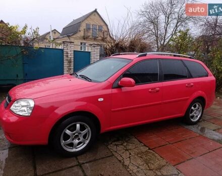 Красный Шевроле Нубира, объемом двигателя 1.6 л и пробегом 235 тыс. км за 3900 $, фото 2 на Automoto.ua