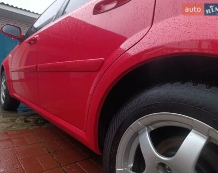 Красный Шевроле Нубира, объемом двигателя 1.6 л и пробегом 235 тыс. км за 3900 $, фото 19 на Automoto.ua