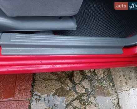 Красный Шевроле Нубира, объемом двигателя 1.6 л и пробегом 235 тыс. км за 3900 $, фото 14 на Automoto.ua