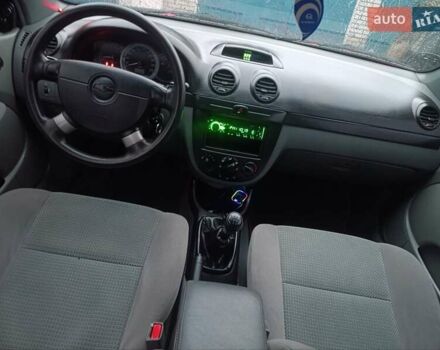 Красный Шевроле Нубира, объемом двигателя 1.6 л и пробегом 235 тыс. км за 3900 $, фото 20 на Automoto.ua