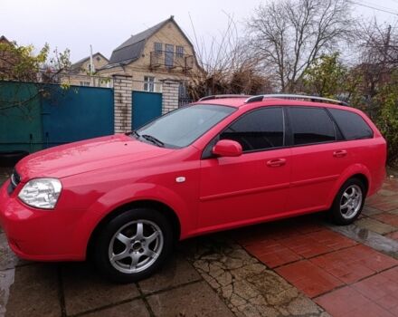 Красный Шевроле Нубира, объемом двигателя 1.6 л и пробегом 235 тыс. км за 3900 $, фото 2 на Automoto.ua