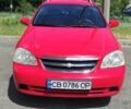 Красный Шевроле Нубира, объемом двигателя 1.6 л и пробегом 235 тыс. км за 3800 $, фото 2 на Automoto.ua