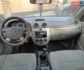 Красный Шевроле Нубира, объемом двигателя 1.6 л и пробегом 210 тыс. км за 5500 $, фото 10 на Automoto.ua