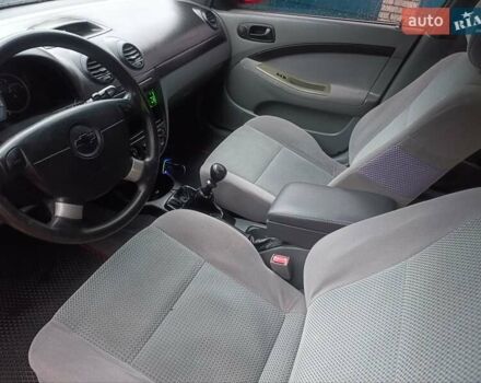 Красный Шевроле Нубира, объемом двигателя 1.6 л и пробегом 235 тыс. км за 3900 $, фото 11 на Automoto.ua