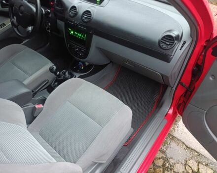 Красный Шевроле Нубира, объемом двигателя 1.6 л и пробегом 235 тыс. км за 3900 $, фото 12 на Automoto.ua