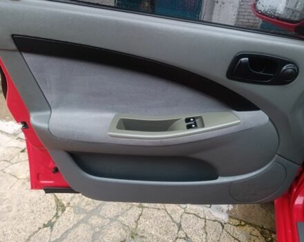 Красный Шевроле Нубира, объемом двигателя 1.6 л и пробегом 235 тыс. км за 3900 $, фото 11 на Automoto.ua