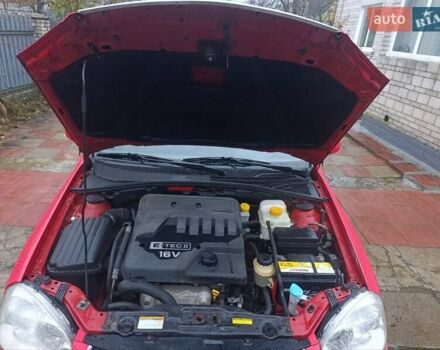 Красный Шевроле Нубира, объемом двигателя 1.6 л и пробегом 235 тыс. км за 3900 $, фото 23 на Automoto.ua
