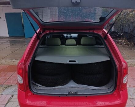 Красный Шевроле Нубира, объемом двигателя 1.6 л и пробегом 235 тыс. км за 3900 $, фото 7 на Automoto.ua