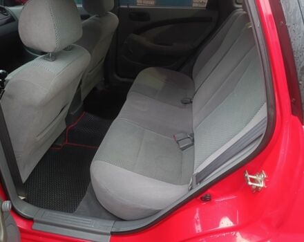 Красный Шевроле Нубира, объемом двигателя 1.6 л и пробегом 235 тыс. км за 3900 $, фото 9 на Automoto.ua