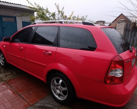 Красный Шевроле Нубира, объемом двигателя 1.6 л и пробегом 235 тыс. км за 3900 $, фото 4 на Automoto.ua