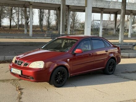 Красный Шевроле Нубира, объемом двигателя 1.8 л и пробегом 231 тыс. км за 3500 $, фото 1 на Automoto.ua