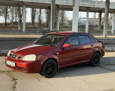 Красный Шевроле Нубира, объемом двигателя 1.8 л и пробегом 231 тыс. км за 3500 $, фото 1 на Automoto.ua