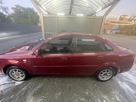 Красный Шевроле Нубира, объемом двигателя 1.8 л и пробегом 250 тыс. км за 3099 $, фото 1 на Automoto.ua