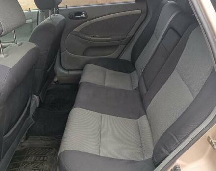 Желтый Шевроле Нубира, объемом двигателя 1.8 л и пробегом 444 тыс. км за 3500 $, фото 1 на Automoto.ua