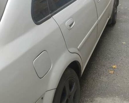 Сірий Шевроле Нубіра, об'ємом двигуна 1.8 л та пробігом 202 тис. км за 3500 $, фото 2 на Automoto.ua