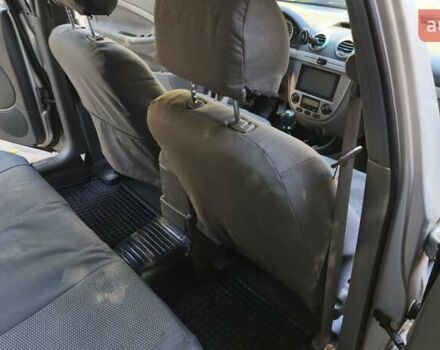 Серый Шевроле Нубира, объемом двигателя 1.8 л и пробегом 201 тыс. км за 4800 $, фото 12 на Automoto.ua