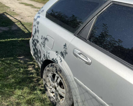 Серый Шевроле Нубира, объемом двигателя 1.8 л и пробегом 370 тыс. км за 3300 $, фото 7 на Automoto.ua