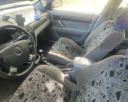 Синий Шевроле Нубира, объемом двигателя 1.6 л и пробегом 291 тыс. км за 2700 $, фото 7 на Automoto.ua