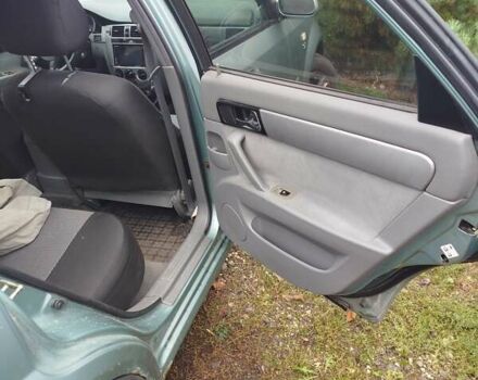 Зеленый Шевроле Нубира, объемом двигателя 1.6 л и пробегом 245 тыс. км за 3900 $, фото 9 на Automoto.ua