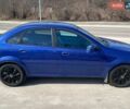 Синий Шевроле Optra, объемом двигателя 1.6 л и пробегом 228 тыс. км за 3200 $, фото 3 на Automoto.ua