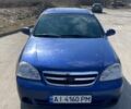 Синий Шевроле Optra, объемом двигателя 2 л и пробегом 228 тыс. км за 3700 $, фото 1 на Automoto.ua