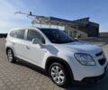 Белый Шевроле Орландо, объемом двигателя 1.8 л и пробегом 309 тыс. км за 7172 $, фото 1 на Automoto.ua