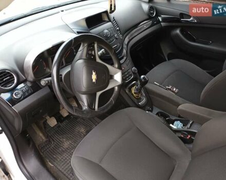 Белый Шевроле Орландо, объемом двигателя 1.8 л и пробегом 180 тыс. км за 8900 $, фото 29 на Automoto.ua