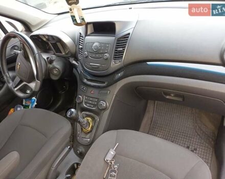 Белый Шевроле Орландо, объемом двигателя 1.8 л и пробегом 180 тыс. км за 8900 $, фото 11 на Automoto.ua