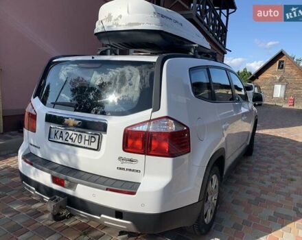 Білий Шевроле Орландо, об'ємом двигуна 2 л та пробігом 215 тис. км за 8800 $, фото 2 на Automoto.ua