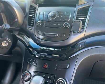 Білий Шевроле Орландо, об'ємом двигуна 2 л та пробігом 190 тис. км за 8200 $, фото 4 на Automoto.ua