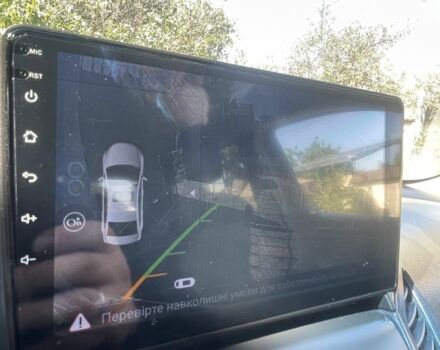 Білий Шевроле Орландо, об'ємом двигуна 2 л та пробігом 190 тис. км за 8200 $, фото 9 на Automoto.ua