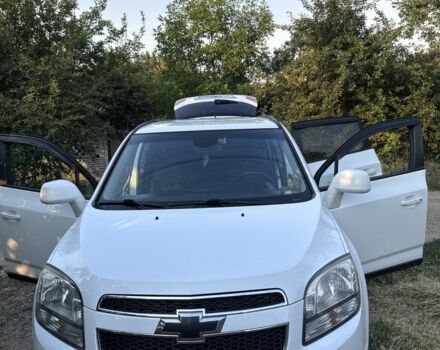 Белый Шевроле Орландо, объемом двигателя 1.8 л и пробегом 195 тыс. км за 9300 $, фото 1 на Automoto.ua