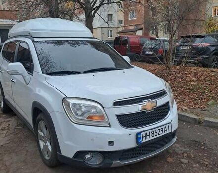 Белый Шевроле Орландо, объемом двигателя 2 л и пробегом 105 тыс. км за 10800 $, фото 1 на Automoto.ua