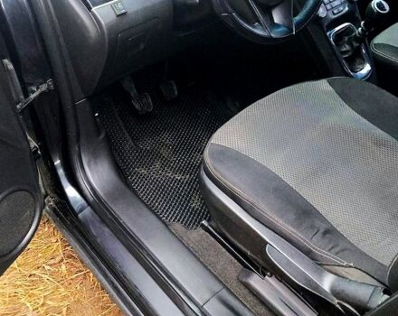 Черный Шевроле Орландо, объемом двигателя 1.8 л и пробегом 269 тыс. км за 8555 $, фото 4 на Automoto.ua