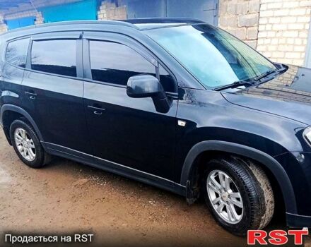 Черный Шевроле Орландо, объемом двигателя 1.8 л и пробегом 269 тыс. км за 8555 $, фото 1 на Automoto.ua