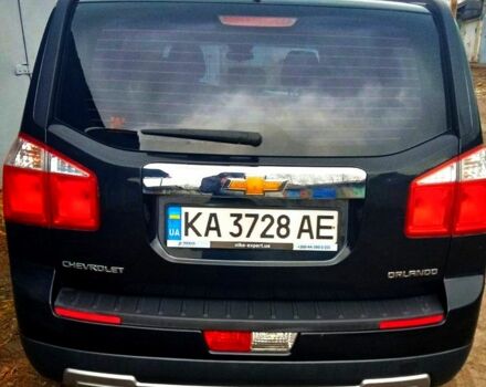 Черный Шевроле Орландо, объемом двигателя 1.8 л и пробегом 269 тыс. км за 8555 $, фото 3 на Automoto.ua