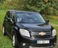 Черный Шевроле Орландо, объемом двигателя 1.8 л и пробегом 240 тыс. км за 9200 $, фото 1 на Automoto.ua